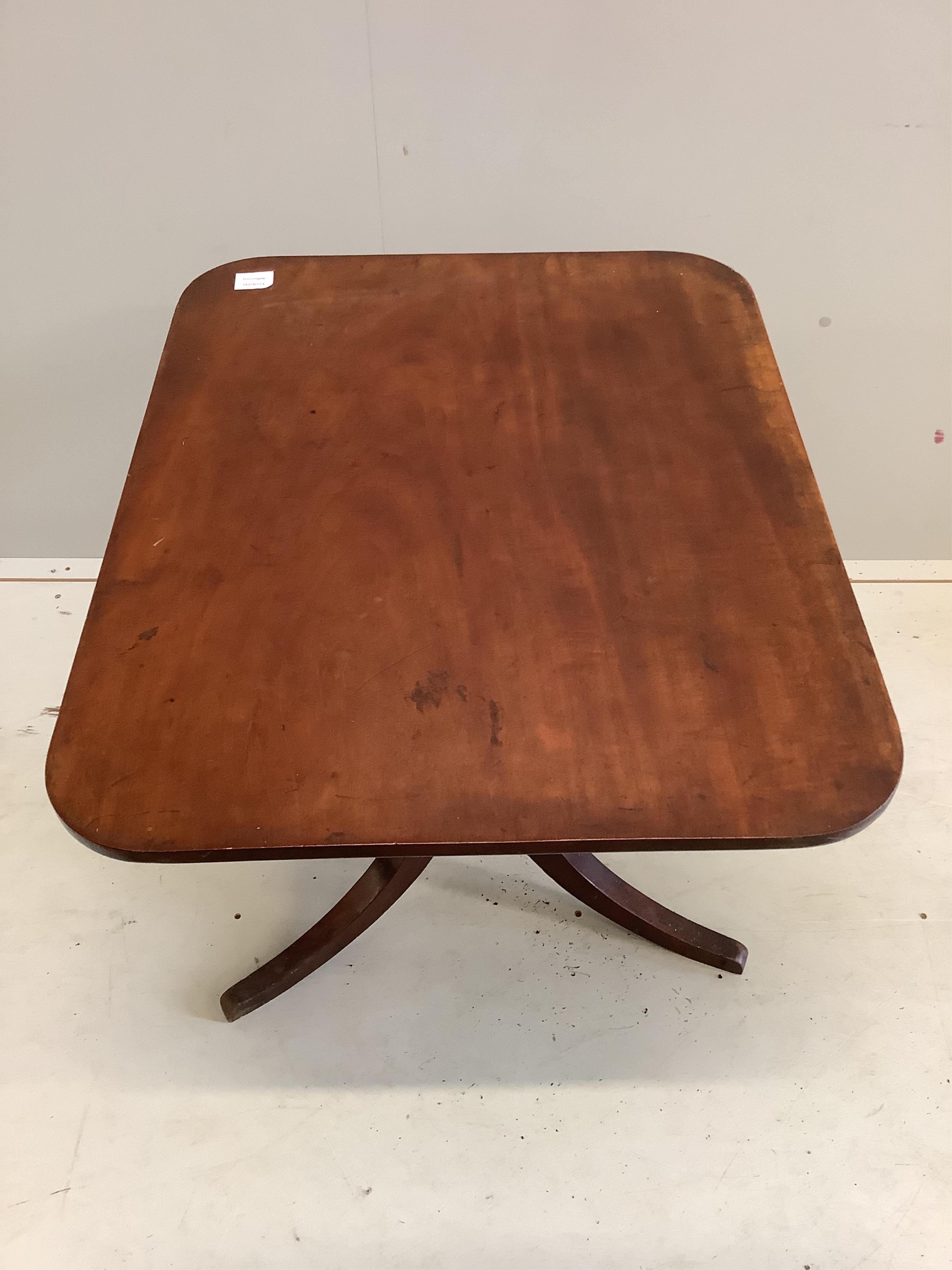 A Victorian rectangular mahogany tilt top tripod tea table, width 76cm, depth 61cm, height 67cm. Condition - fair